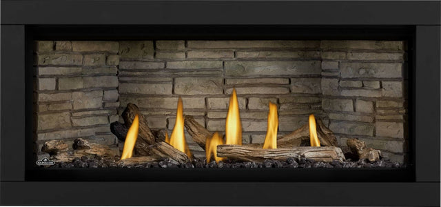 Napoleon Ascent Linear Premium 46 with driftwood logs and Ledgestone panels