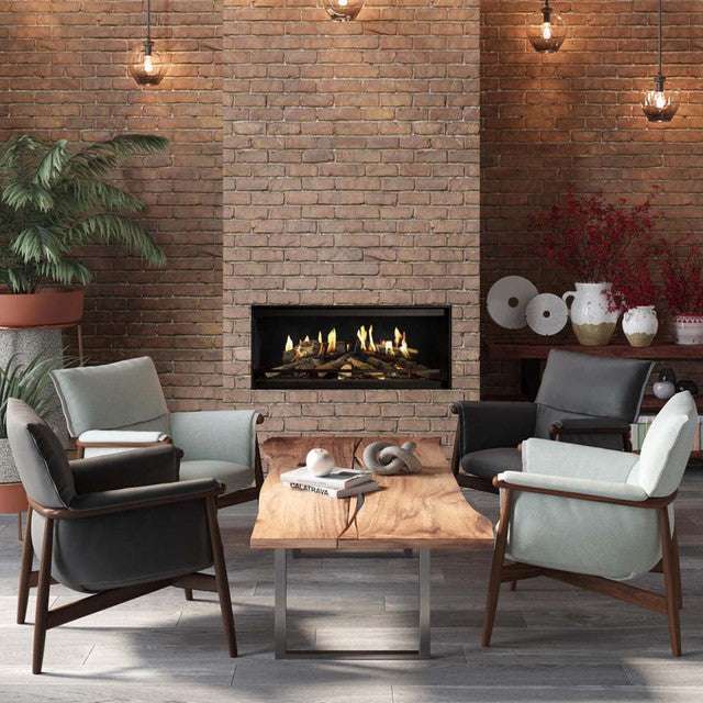 NetZero Fire E-One 130F 3D Electric Fireplace - Front - AA-11-05387 placed in a cozy seating area with mid-century modern chairs and a rustic brick wall.