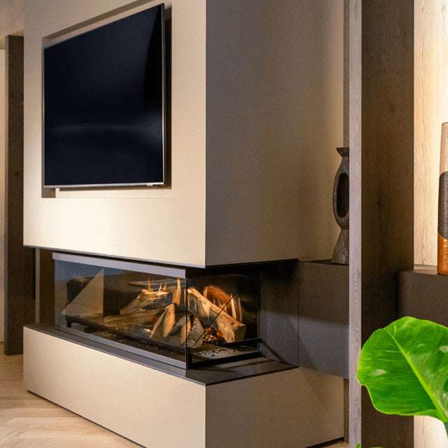 NetZero Fire E-One 130B 3D Electric Fireplace - Bay model installed in a modern living room under a wall-mounted TV. Features realistic holographic flames.