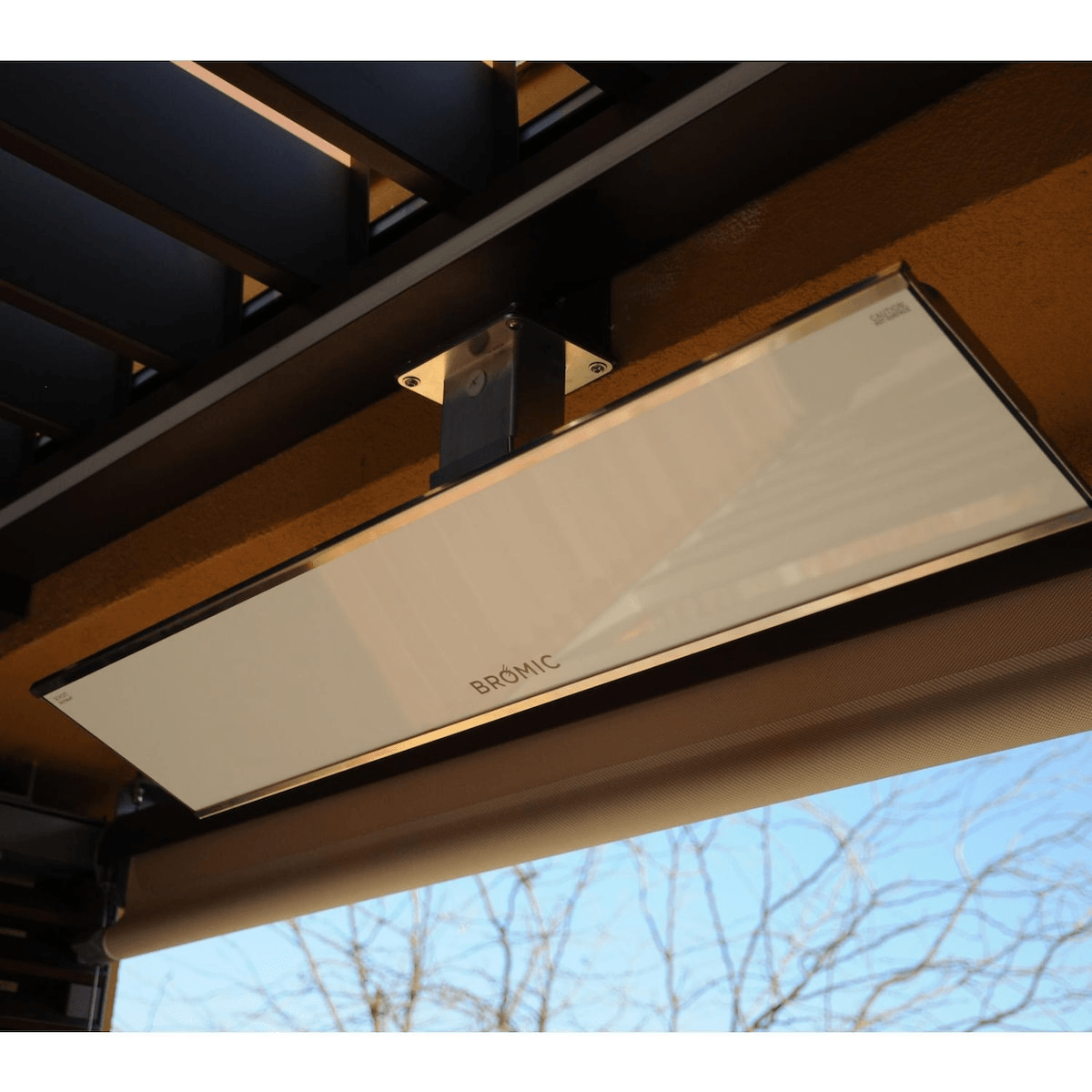 Bromic Heating Platinum Smart-Heat 53-Inch 4500W Electric Infrared Heater in white mounted under a patio roof, ideal for outdoor climate control.