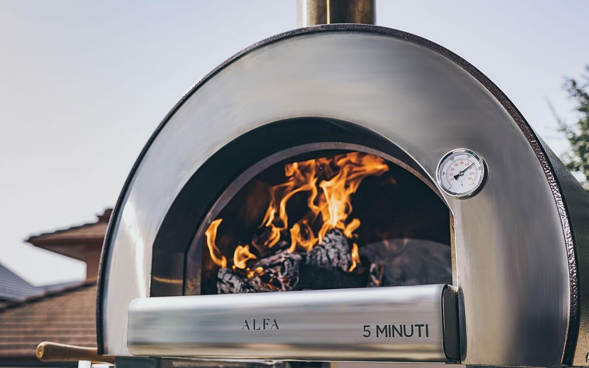 http://nycfireplaceshop.com/cdn/shop/products/alfa-5-minuti-23-inch-outdoor-countertop-wood-fired-pizza-oven-copper-611395_1200x1200.jpg?v=1702755501