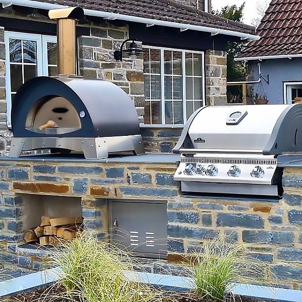 http://nycfireplaceshop.com/cdn/shop/products/alfa-ciao-27-inch-wood-fired-outdoor-countertop-pizza-oven-silver-grey-692019_1200x1200.jpg?v=1682693096