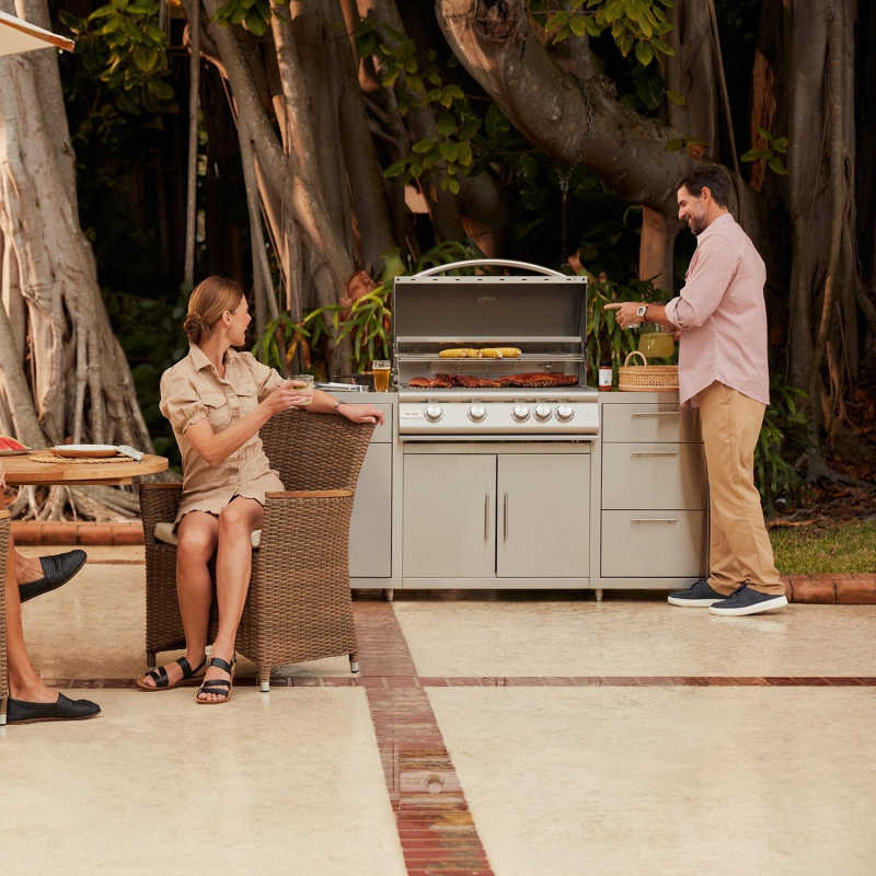 Blaze Premium LTE+ Marine Grade 316L stainless steel grill cooking in an outdoor kitchen island