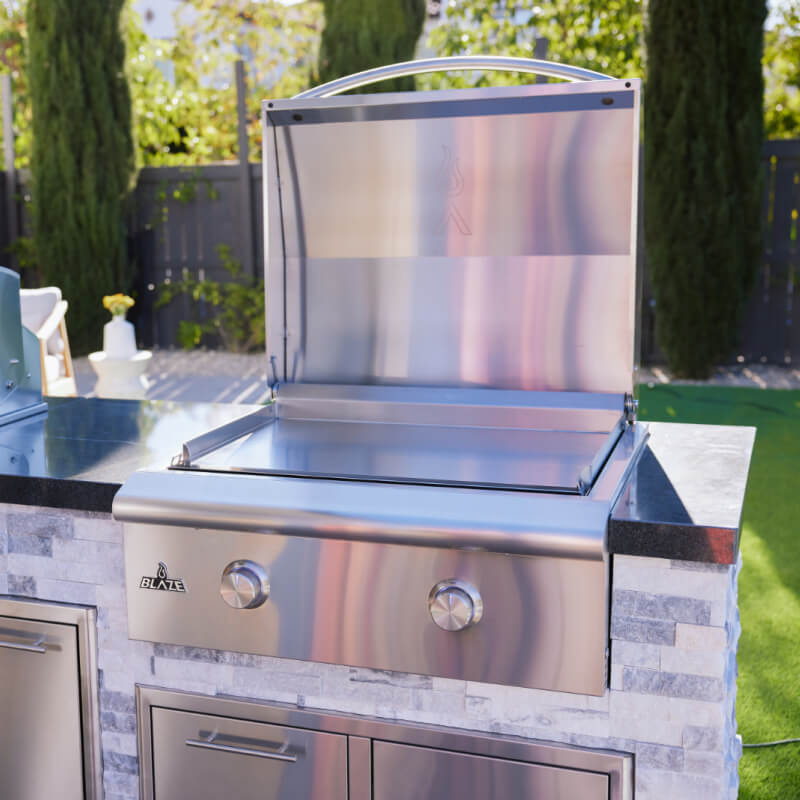 Blaze Premium LTE+ 30 inch built in gas griddle installed in a stainless outdoor kitchen island