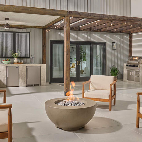 American Fyre Designs 36-Inch Chat Fire Bowl - lit patio view
