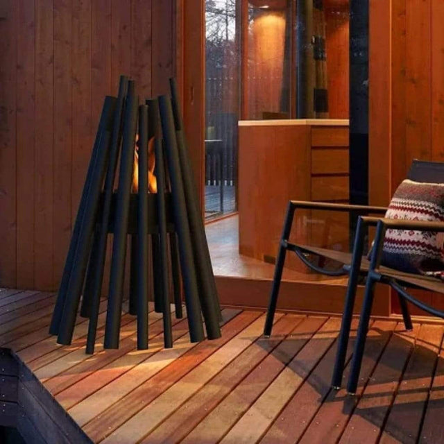 EcoSmart Fire Stix 8 Fire Pit in black - 45 degree angle with lit flame