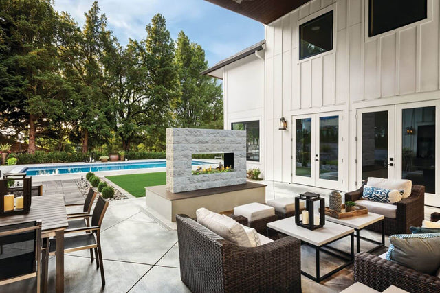 Napoleon Galaxy 50 outdoor gas fireplace installed in a backyard