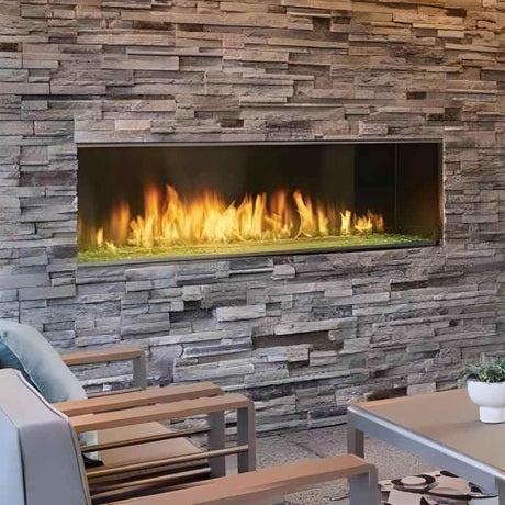 Majestic Lanai 60 outdoor linear gas fireplace on a front porch with crushed glass media