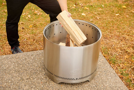 Napoleon Timberwolf smokeless fire pit outdoor lifestyle view