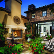 Superior WRE4500 outdoor wood-burning fireplace with white refractory panels, front view