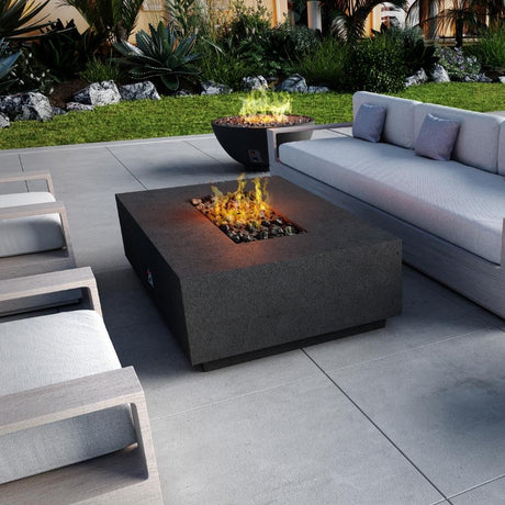 Firegear Sanctuary Rectangular Concrete Gas Fire Pit Table in Raven finish, featured in a modern patio setup with adjustable flame.