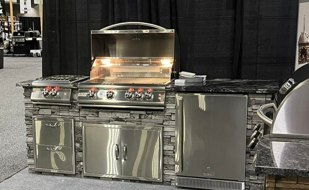 https://nycfireplaceshop.com/cdn/shop/products/tru-innovative-8-foot-outdoor-kitchen-island-package-includes-32-lte-grill-side-burner-refrigerator-drawers-doors-island-top-510388.jpg?v=1682695586&width=997
